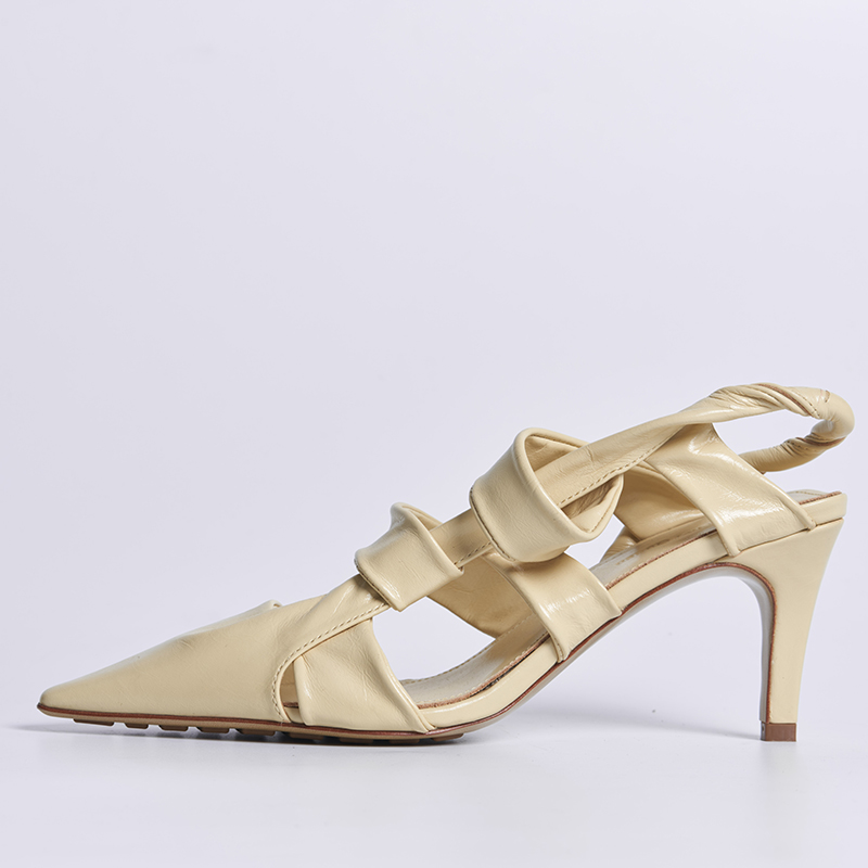 Elegant slingback high heel featuring layered pleated leather construction and slim heel for premium women’s shoe development