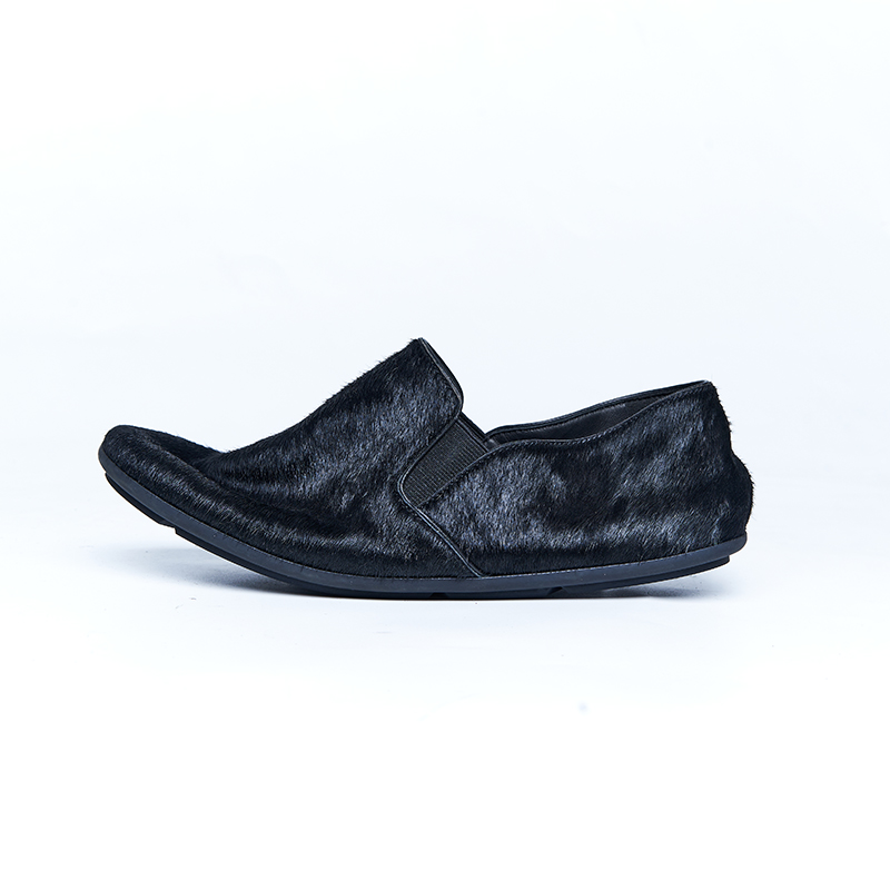 Black leather loafer with soft wrinkled texture and relaxed construction, developed for designer flat footwear collections