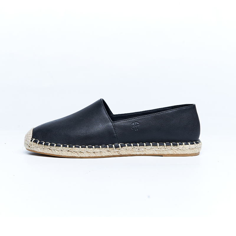 Black leather espadrille flat with hand-stitched jute sole and minimalist upper, developed for modern designer footwear collections