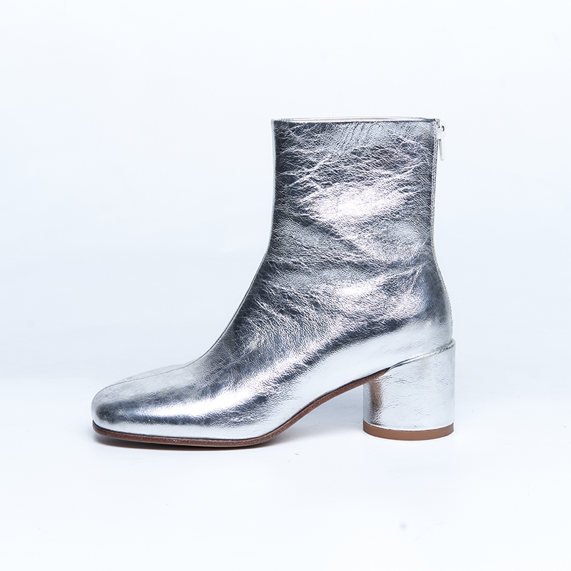 Silver metallic leather ankle boots with mid block heel, fashion-forward design for designer brands OEM ODM