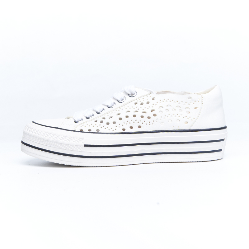White platform sneakers with perforated leather upper and layered sole, fashion-forward design for OEM ODM production