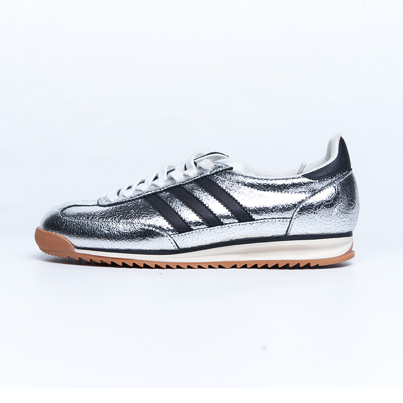 Metallic silver sneakers with leather upper and striped detailing, fashion-forward design for OEM ODM production