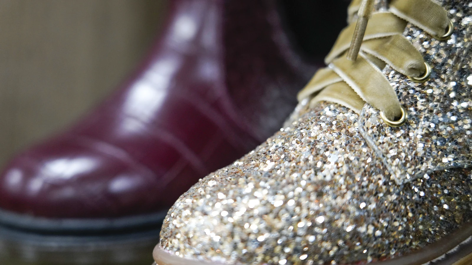 Close-up footwear craftsmanship showing complex material and upper details