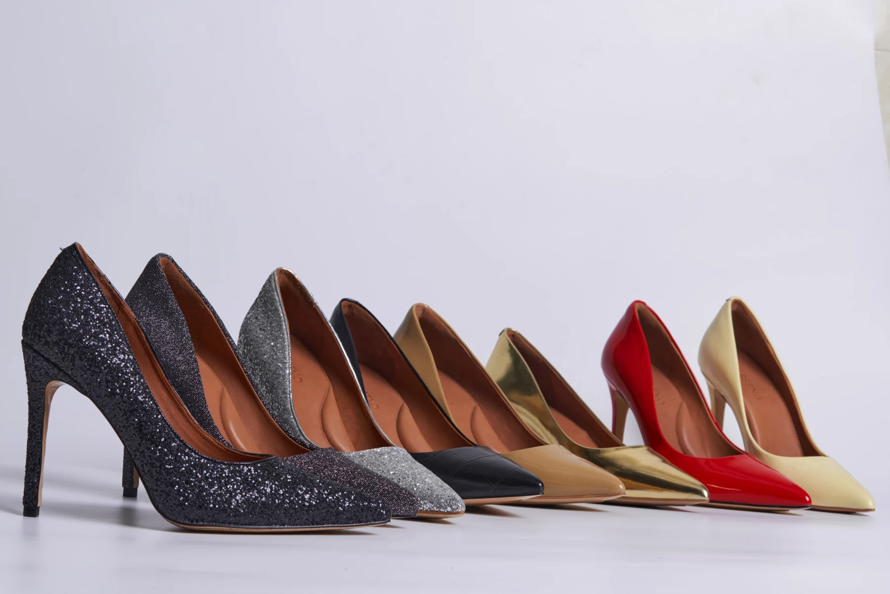 A coordinated collection of women's pumps developed for fashion brands