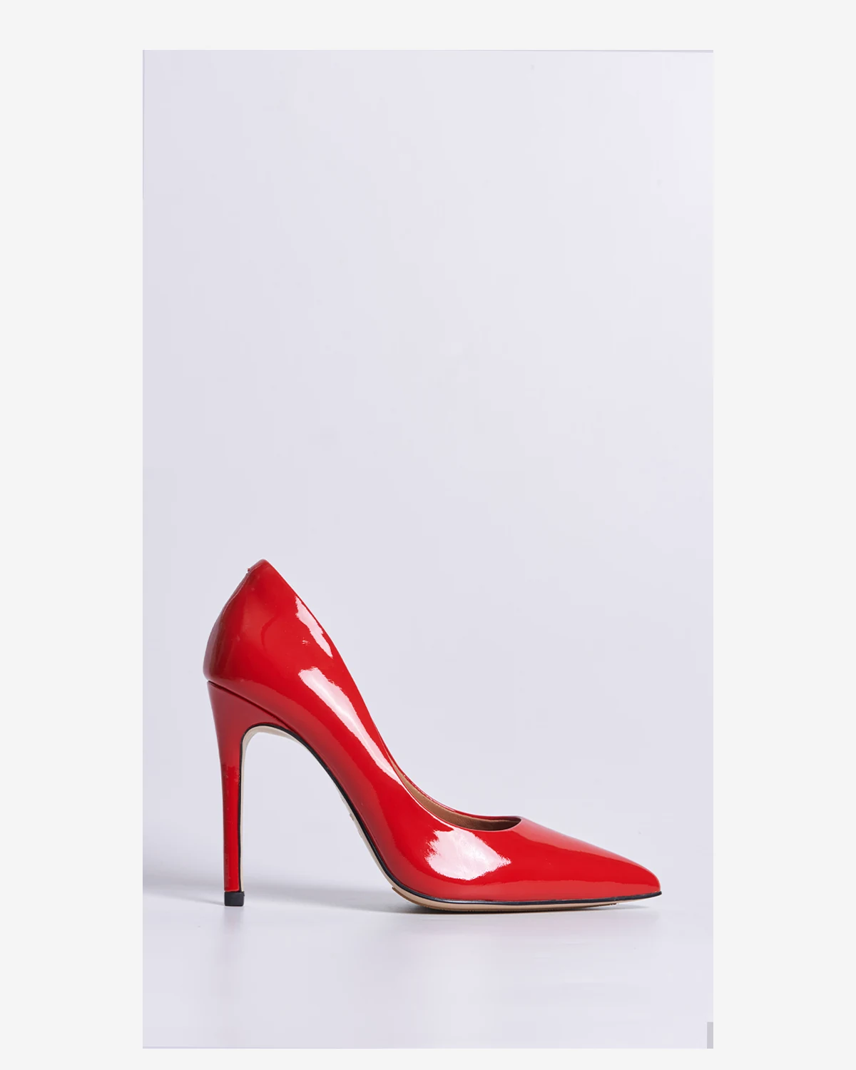 Red patent leather statement heel developed for custom footwear production